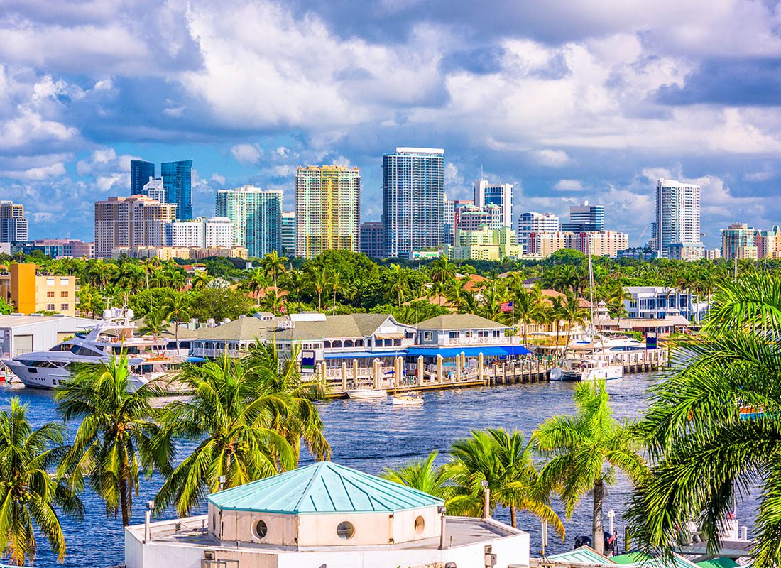 Contact - Aerial View of the Fort Lauderdale, Florida Skyline on a Sunny and Cloudy Day